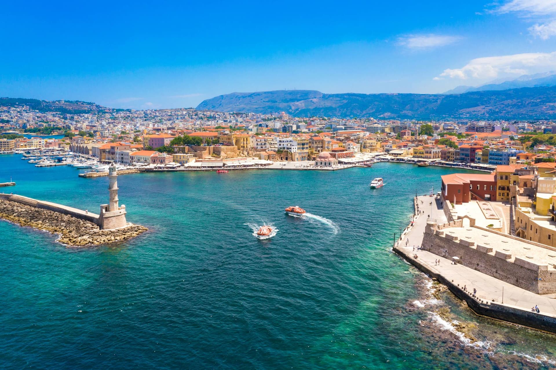 Birds-eye view of the beautiful city of Chania with it's old harbour and the famous lighthouse, Crete, Greece.