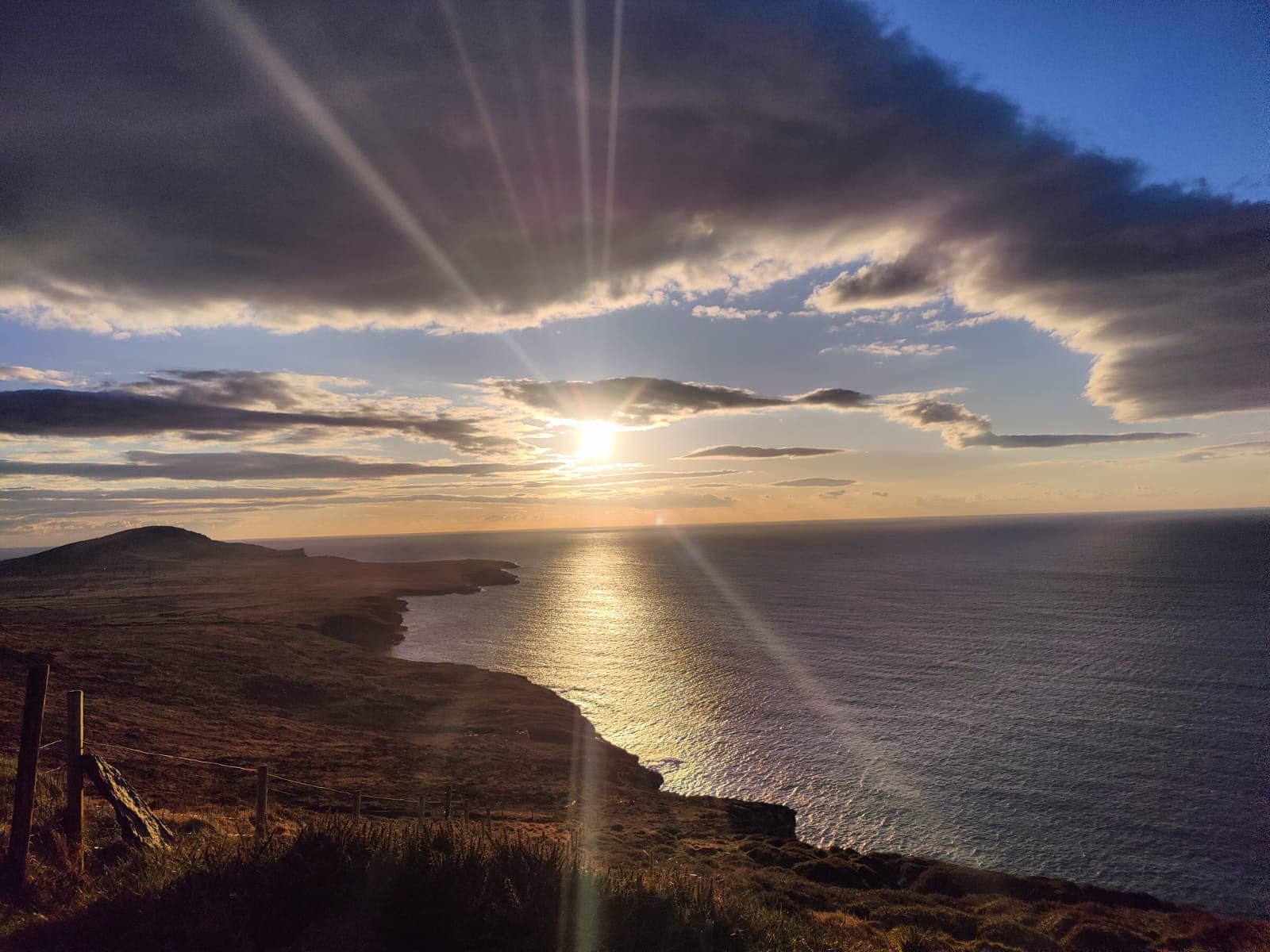 A spectacular sunset on the rugged Irish coast.