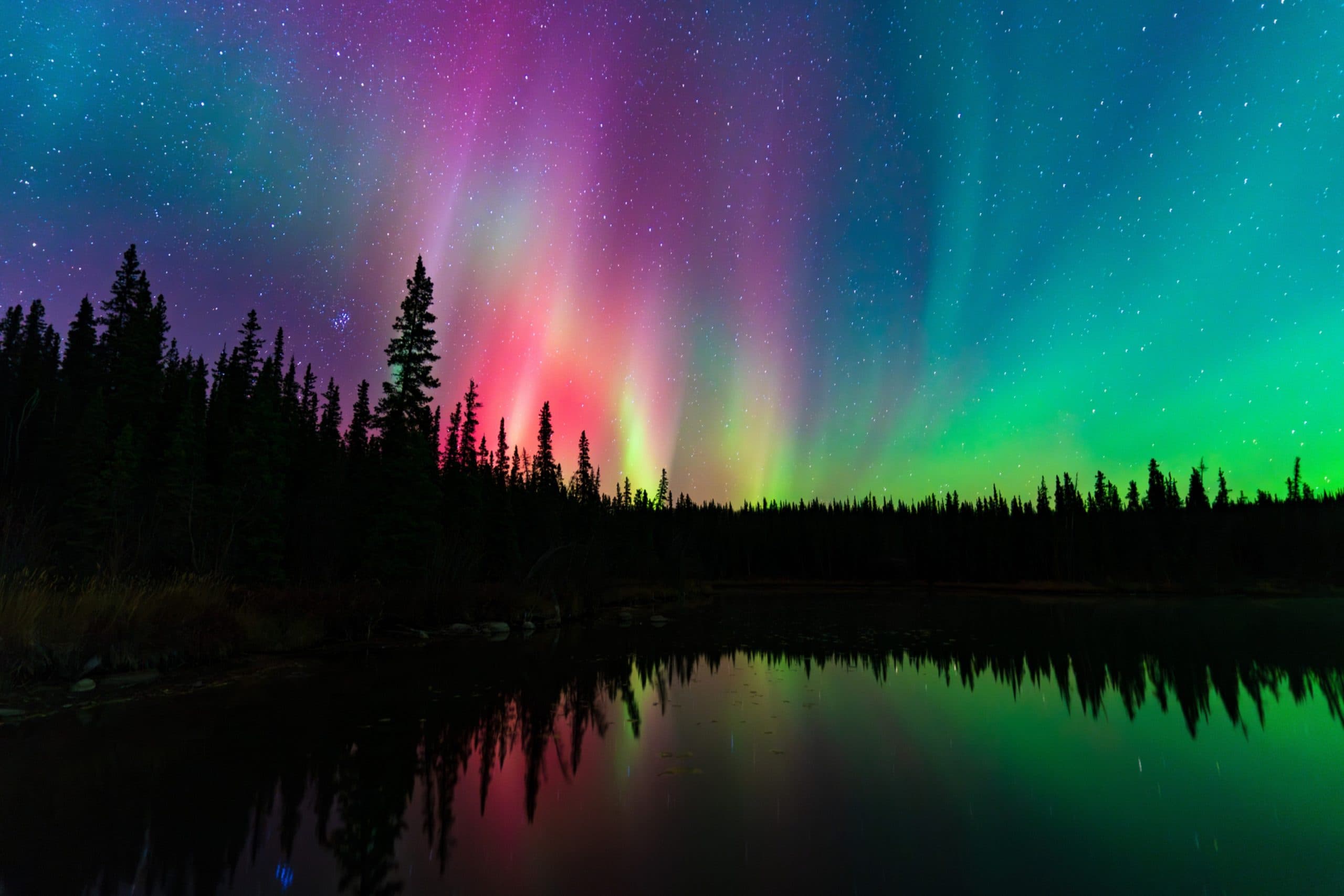 A long exposure image of the Northern Lights taken in the dark
