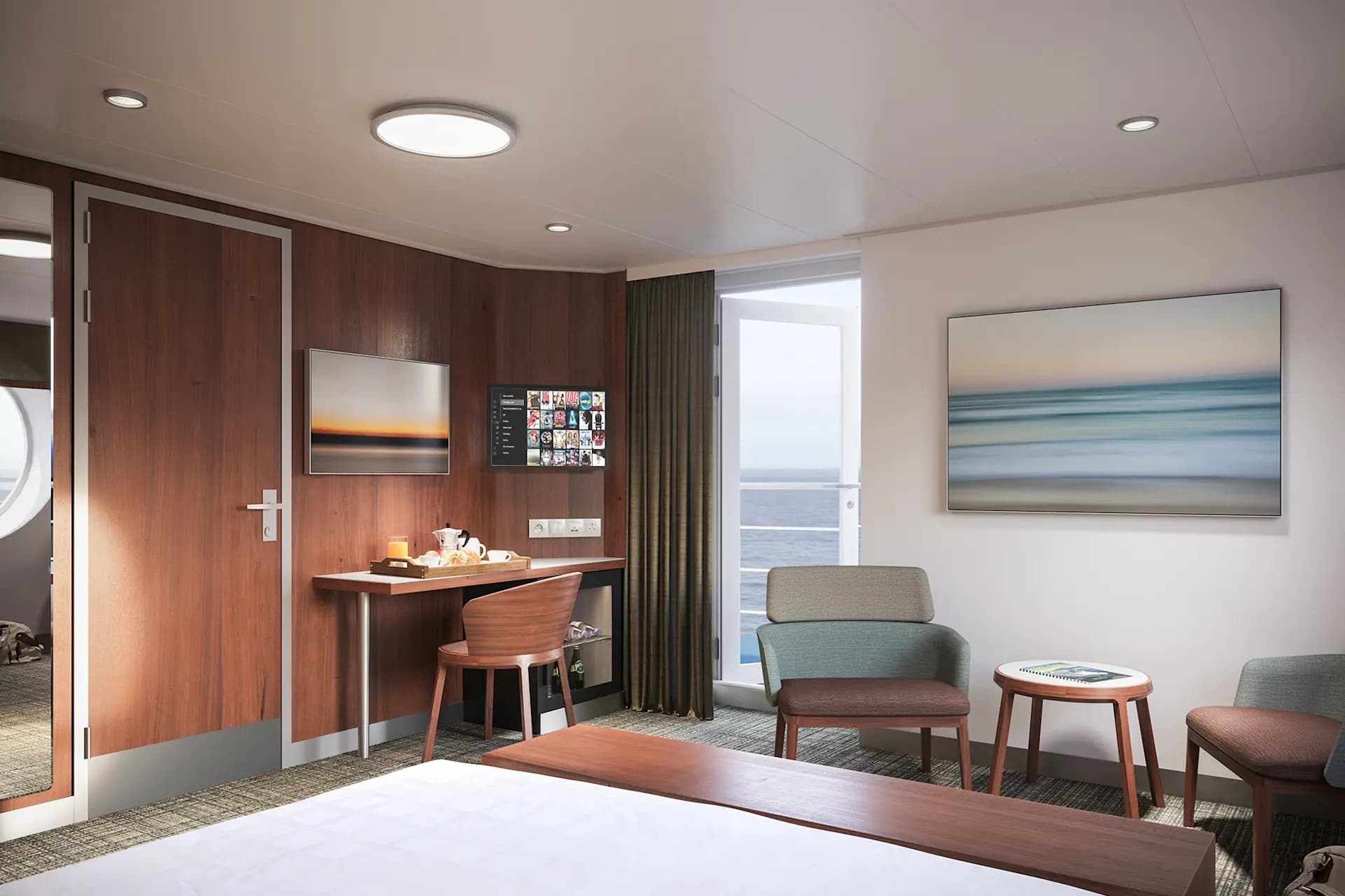 2-bed Commodore Suites on board Galicia with double beds, direct access to the outside deck, TV + VOD, a minibar.