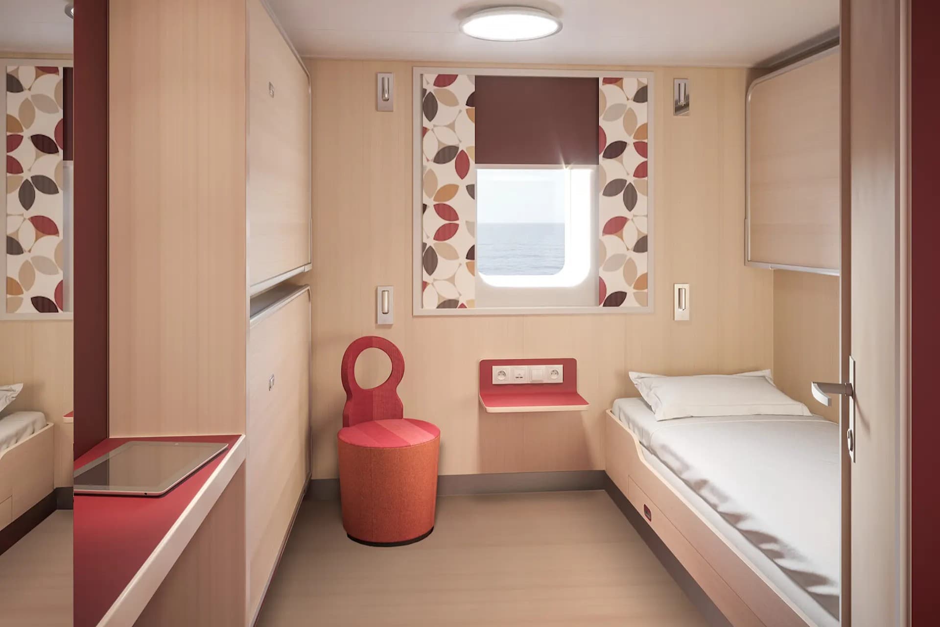 Red and cream colored Premium Plus cabins with ensuite facilities, have a window and laminate flooring with space for a standard-size animal bed.