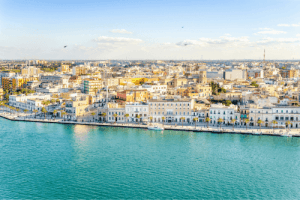 panoramic photo from Brindisi, Italy with colorful houses next to the sea