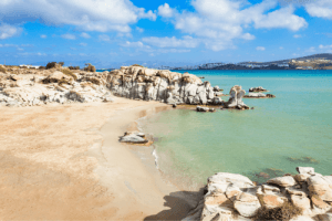popular swimming pool beach on the island of Paros with rocky and sandy beaches