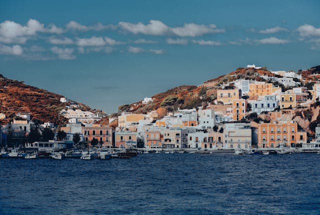 Ponza harbor is bustling with boats moored in the calm waters