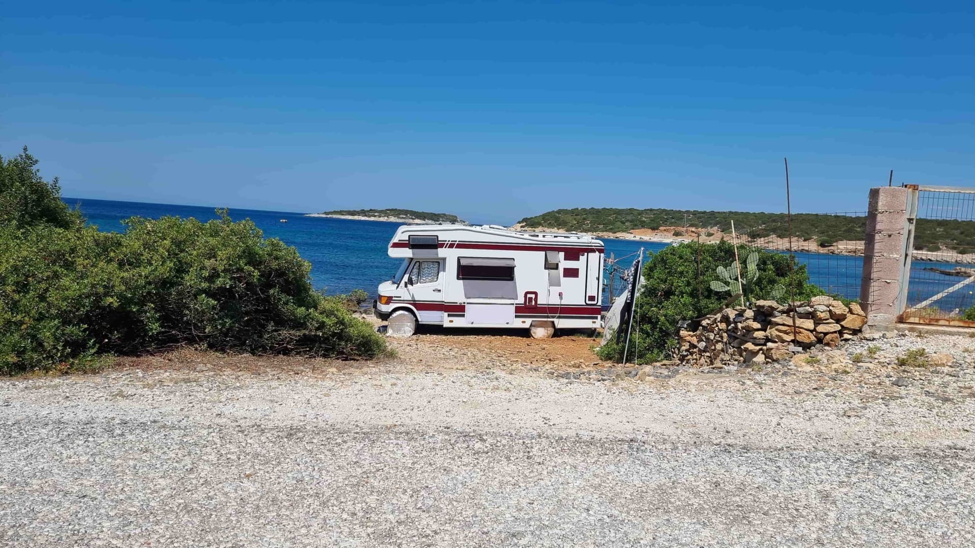 Motorhome in front of a beautiful Greek beach