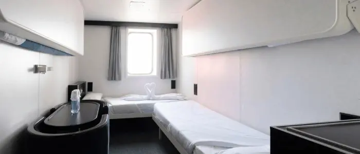 Cabin with window (WC, Bed linen and towels)