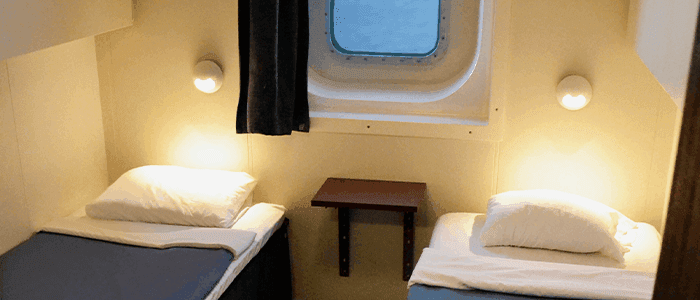 Cabin with window (WC, Bed linen and towels)